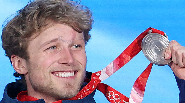 BEIJING, CHINA - FEBRUARY 09: Silver medallist Colby Stevenson of Team United States celebrates during the Men's Freeski Big Air medal ceremony on Day 5 of the Beijing 2022 Winter Olympic Games at Beijing Medal Plaza on February 09, 2022 in Beijing, China. (Photo by Jean Catuffe/Getty Images)